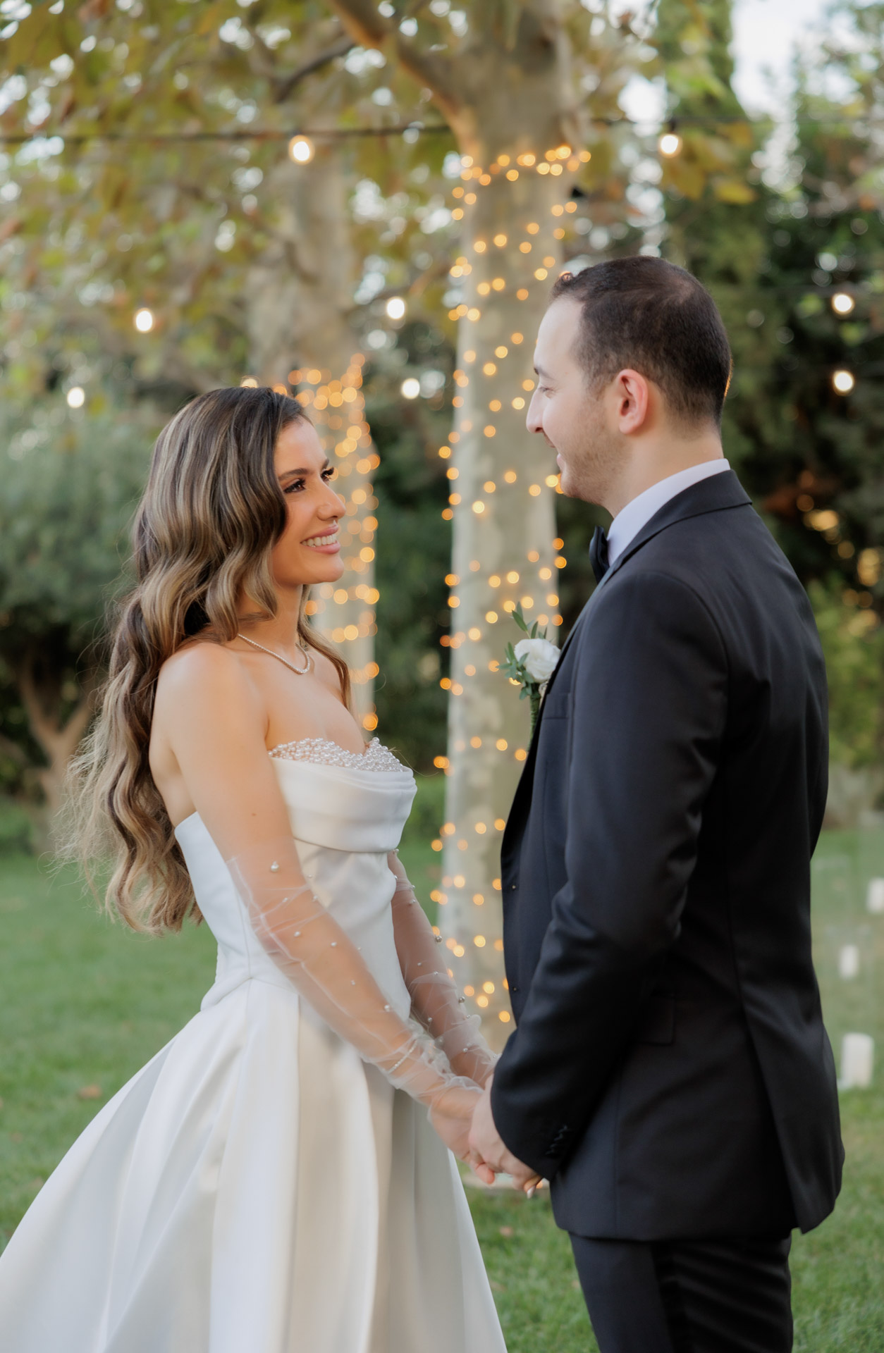 Bride and groom from the US during a glamorous wedding at Pyrgos Petreza, captured by Dimitrios Alexandrakis, best destination wedding photographer in Greece
